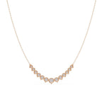 Rose Gold necklace with small round diamonds on a white background