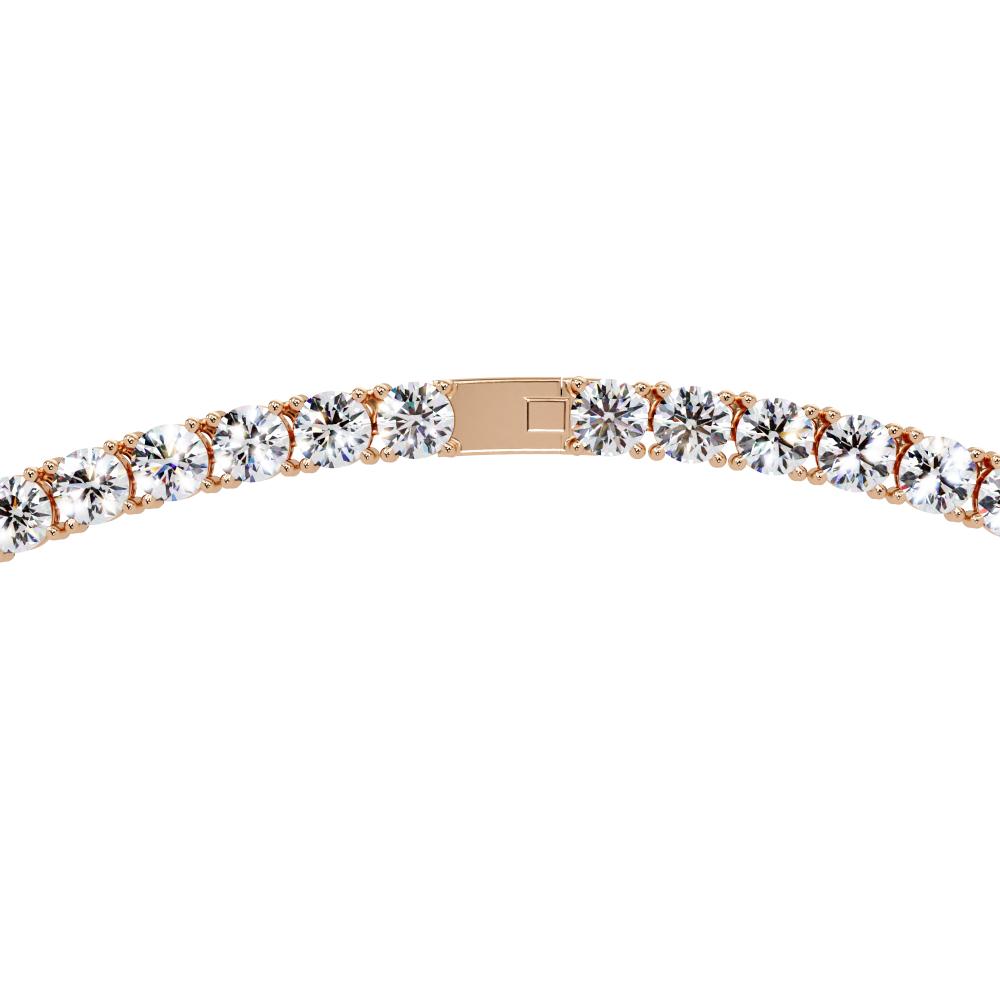 Rose gold diamond necklace on a white background