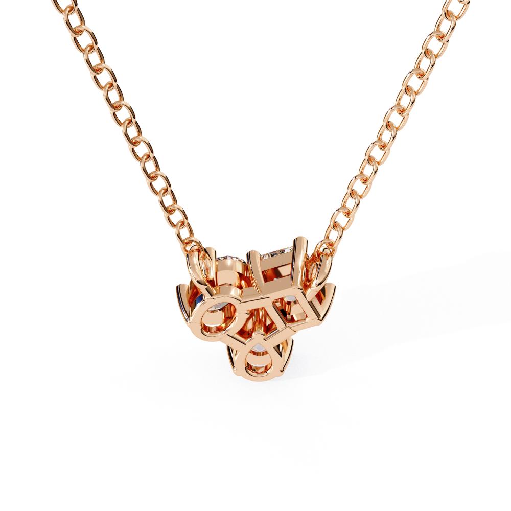 Rose gold necklace with a unique pendant on a white background
