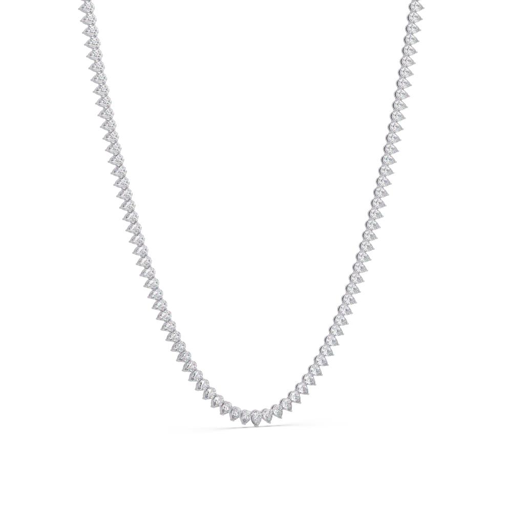 Silver necklace with small pear diamond on a white background