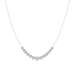 Silver necklace with round-shaped diamond pendant on a white background