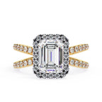Emerald halo diamond ring in gold with crossover design