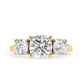 Lab grown cushion cut three-stone diamond ring in gold