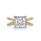Princess halo diamond ring in gold with crossover design