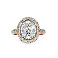 Classic oval diamond engagement ring with twisted halo