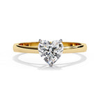 Minimalist gold engagement ring with heart diamond