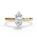 Marquise cut diamond engagement ring with pavé gold band