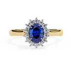 Oval blue sapphire and lab grown diamond halo engagement ring in gold
