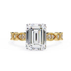 Gold Milgrain Cathedral engagement ring with emerald diamond