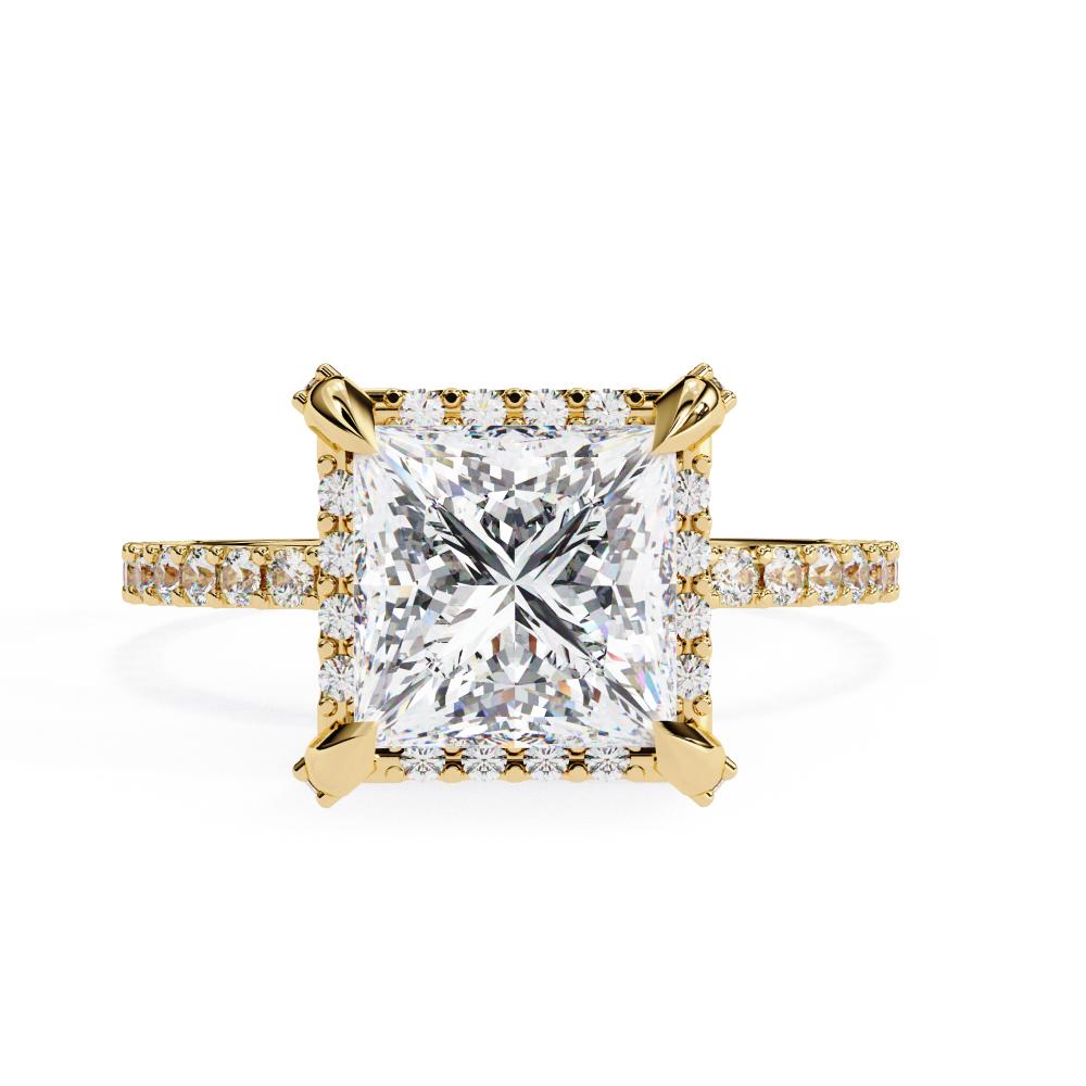 Princess cut diamond halo engagement ring in gold