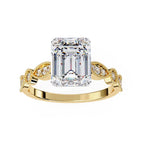 Gold engagement ring with emerald diamond and Milgrain details
