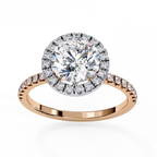 Bridal diamond ring featuring round cut center with halo design