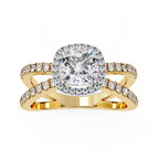 Cushion halo diamond engagement ring in gold with crossover design