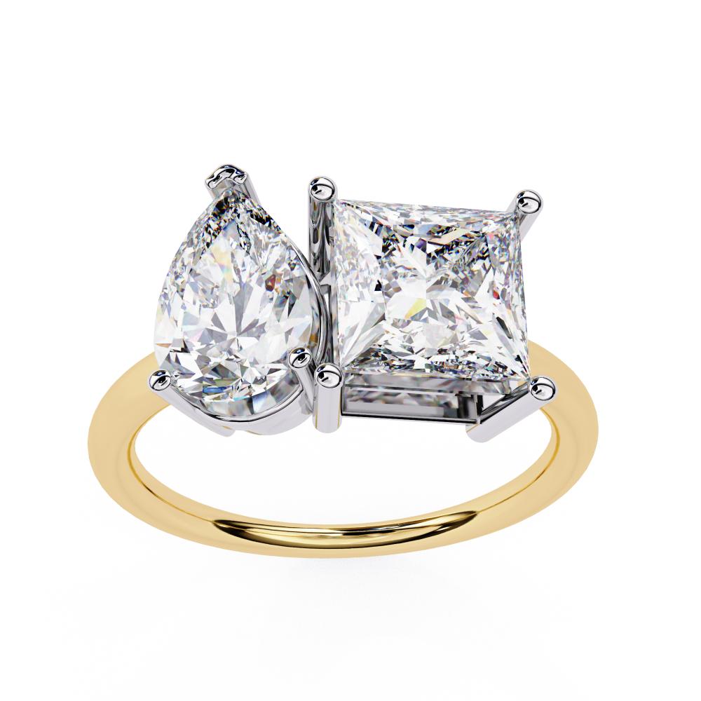 Gold engagement ring with pear and princess lab grown diamonds