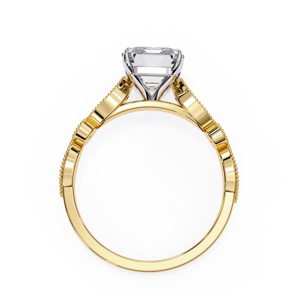 Gold ring with a solitaire diamond on a white background