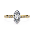 Marquise cut diamond engagement ring with pavé gold band