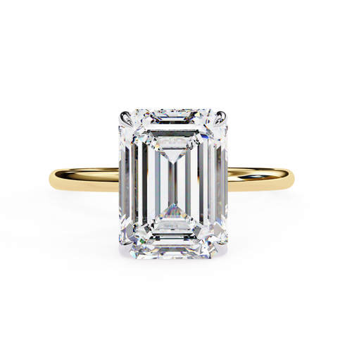 Emerald cut diamond engagement ring in yellow gold
