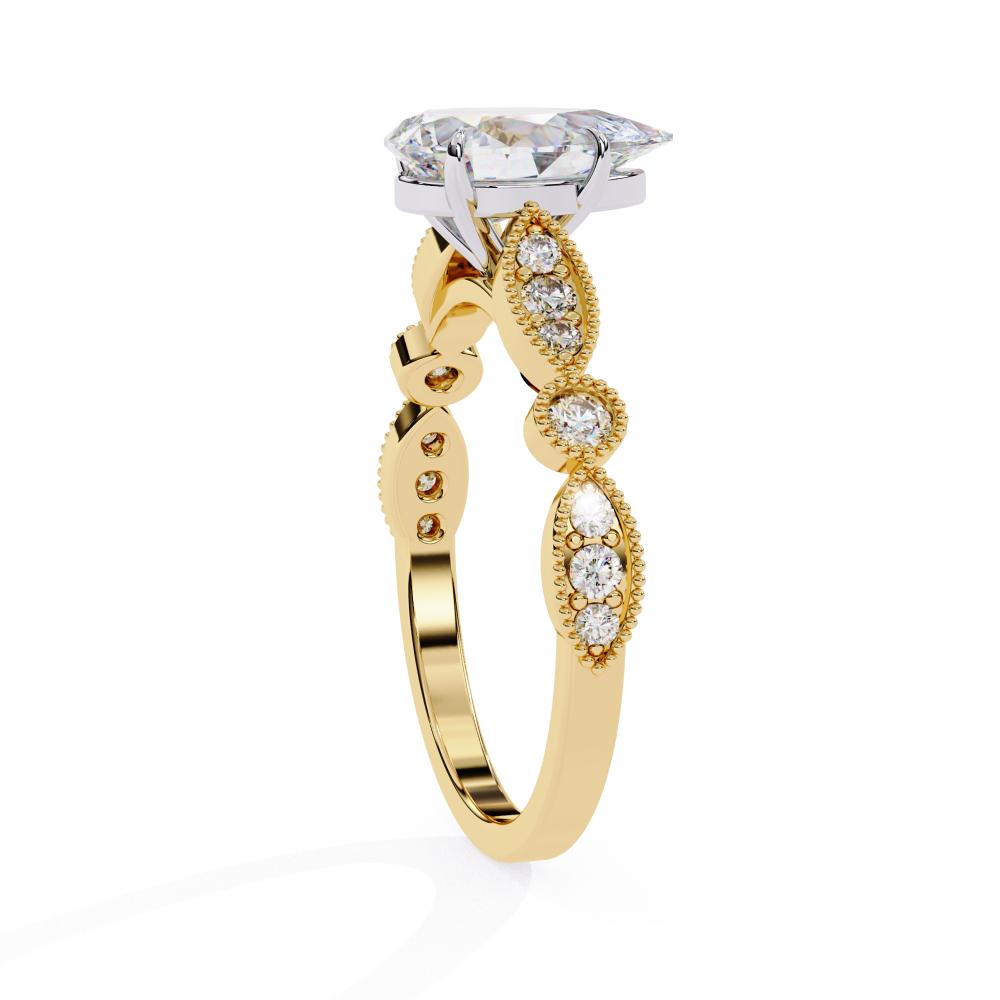 Elegant gold Milgrain Cathedral engagement ring with pear diamond