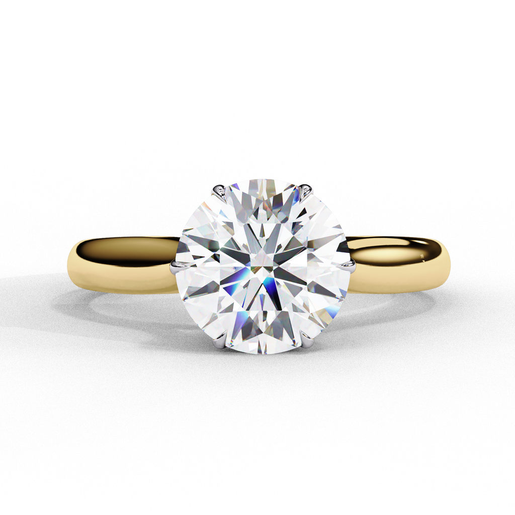 Round diamond engagement ring in yellow gold