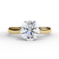 Round diamond engagement ring in yellow gold