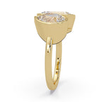 Gold ring with 2 diamonds on a white background