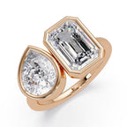 Rose Gold Toi et Moi ring with emerald-cut and pear-shaped diamonds