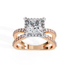 Princess halo diamond engagement ring in rose gold with crossover design
