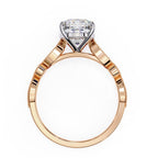 Rose Gold ring with a solitaire diamond on a white background