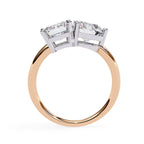 Affordable diamond Toi Et Moi engagement ring with emerald and round diamond