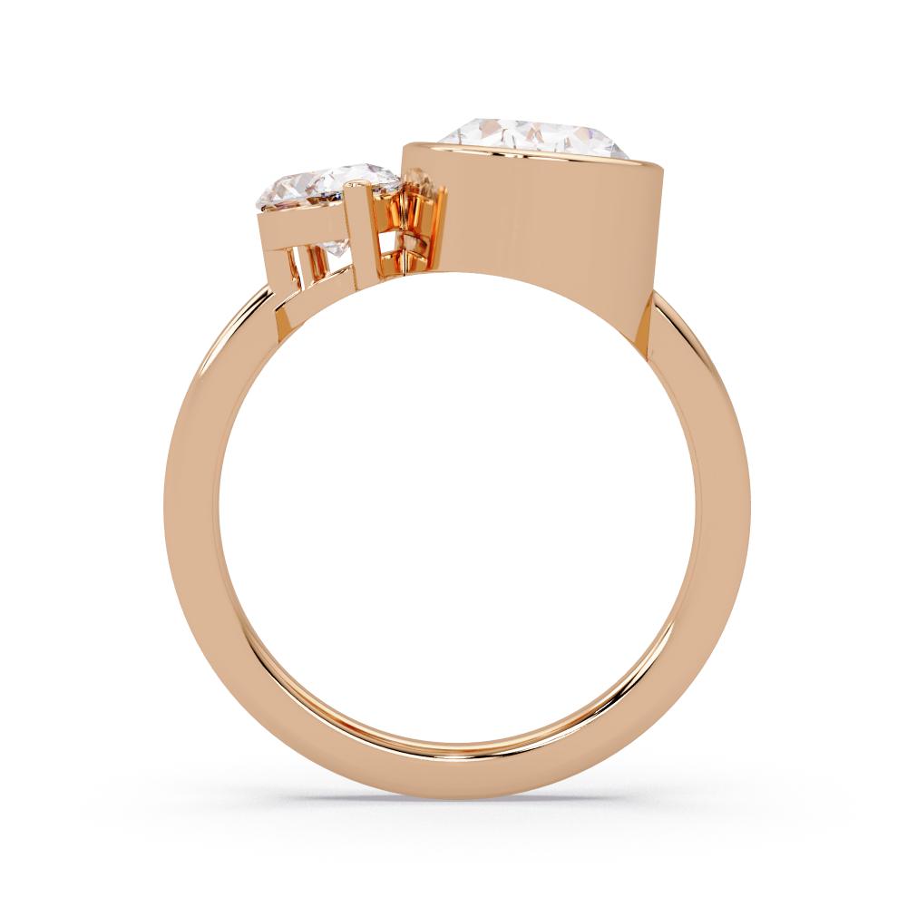 Rose gold ring with two diamonds on a white background