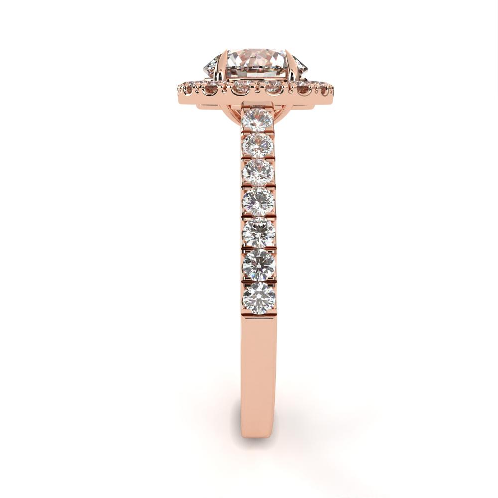 Rose gold ring with diamonds on a white background
