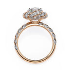 Elegant oval diamond halo engagement ring in rose gold