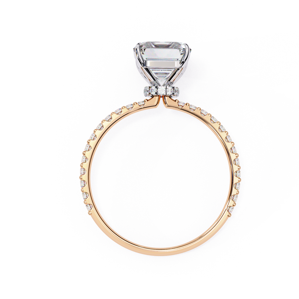 Classic Emerald diamond ring with sparkling pavé shoulders