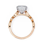 Rose Gold ring with a solitaire diamond on a white background