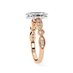 Elegant rose gold Milgrain Cathedral engagement ring with marquise diamond