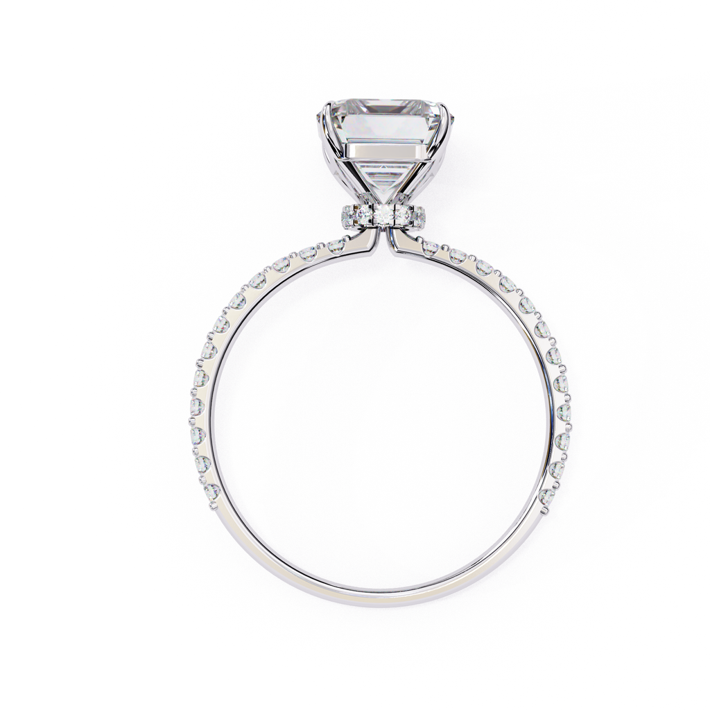 Classic Emerald diamond ring with sparkling pavé shoulders