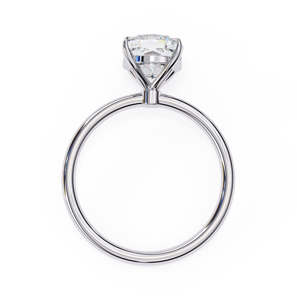 Solitaire diamond ring with cushion cut and polished white gold finish