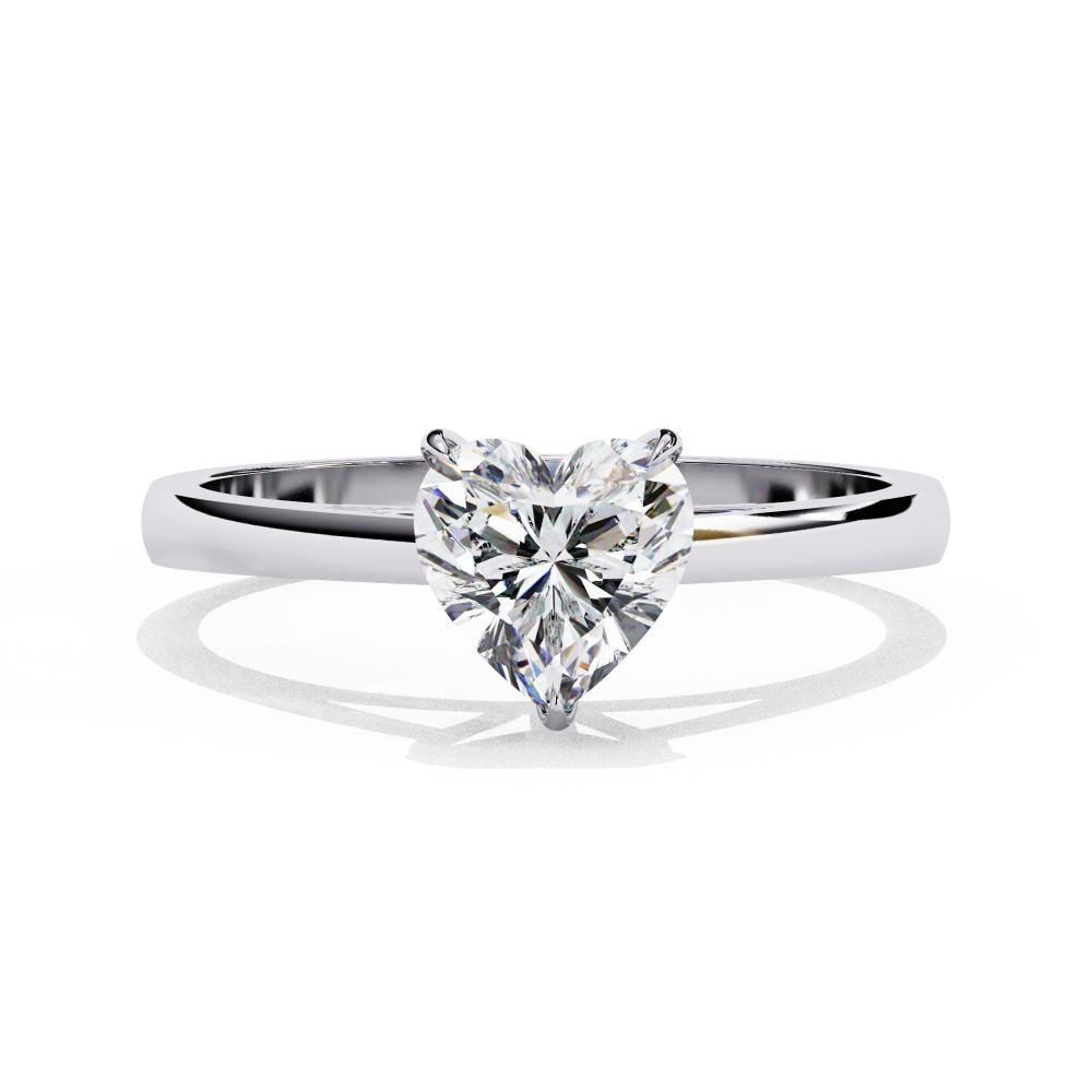 Minimalist white gold engagement ring with heart diamond