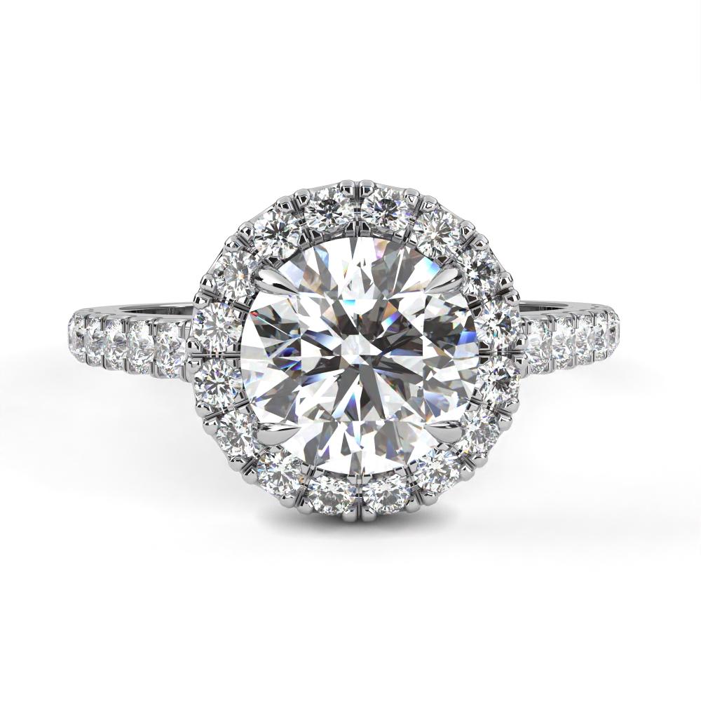 Round diamond halo engagement ring in white gold with pavé band