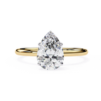Pear cut diamond engagement ring in yellow gold