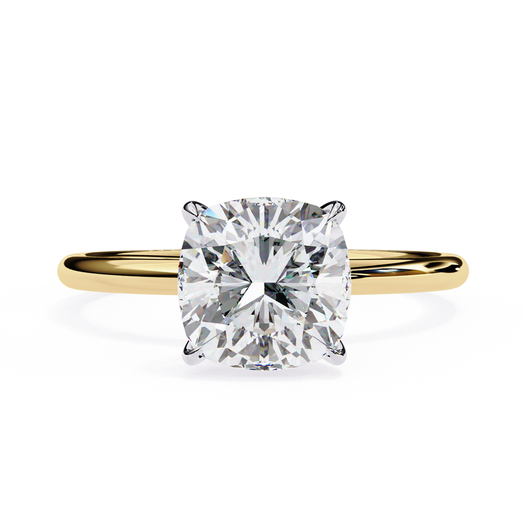Cushion cut diamond engagement ring in yellow gold