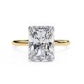 Radiant cut diamond engagement ring in yellow gold