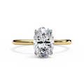 Oval cut diamond engagement ring in yellow gold