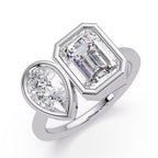 Pear and emerald lab grown diamond bezel Toi et Moi engagement ring in rose gold