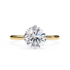 Round diamond engagement ring in yellow gold
