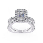 Emerald halo diamond engagement ring in white gold with crossover design