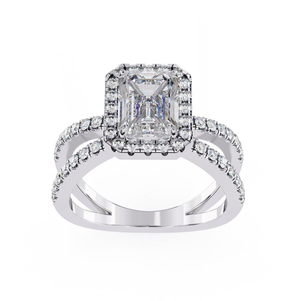 Emerald halo diamond engagement ring in white gold with crossover design
