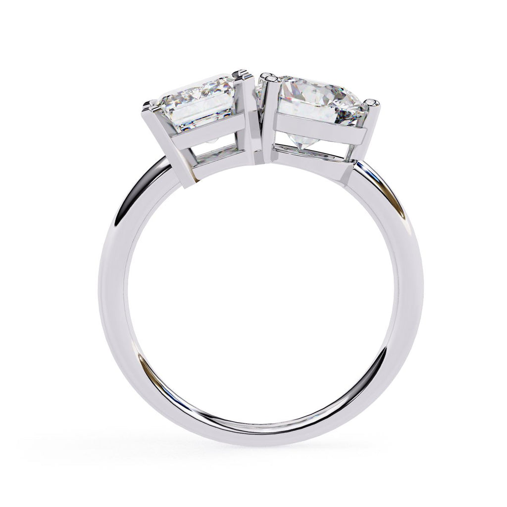 Affordable diamond Toi Et Moi engagement ring with emerald and round diamond