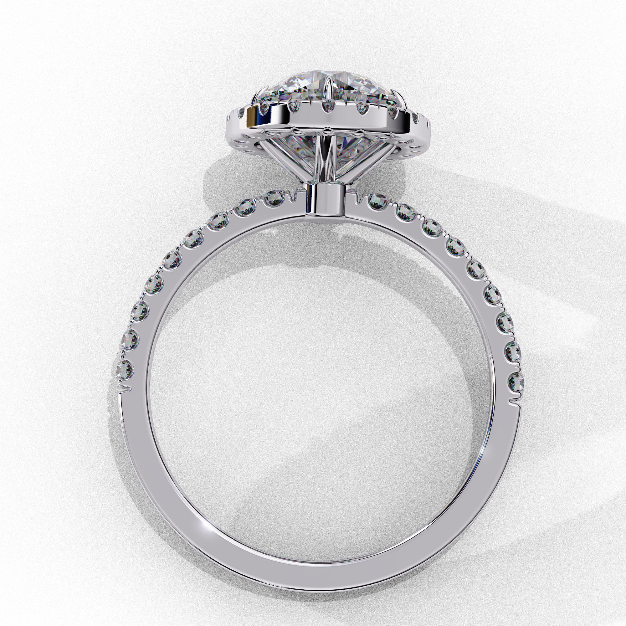 Round brilliant diamond engagement ring with micro pavé gold band