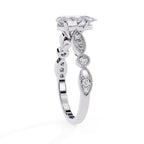 Elegant white gold Milgrain Cathedral engagement ring with pear diamond